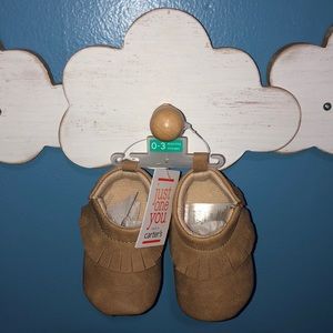 NEW Carter’s baby moccasins, tan. 0-3 months.